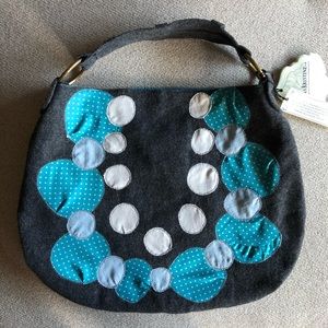 Graphic appliqué hobo day bag